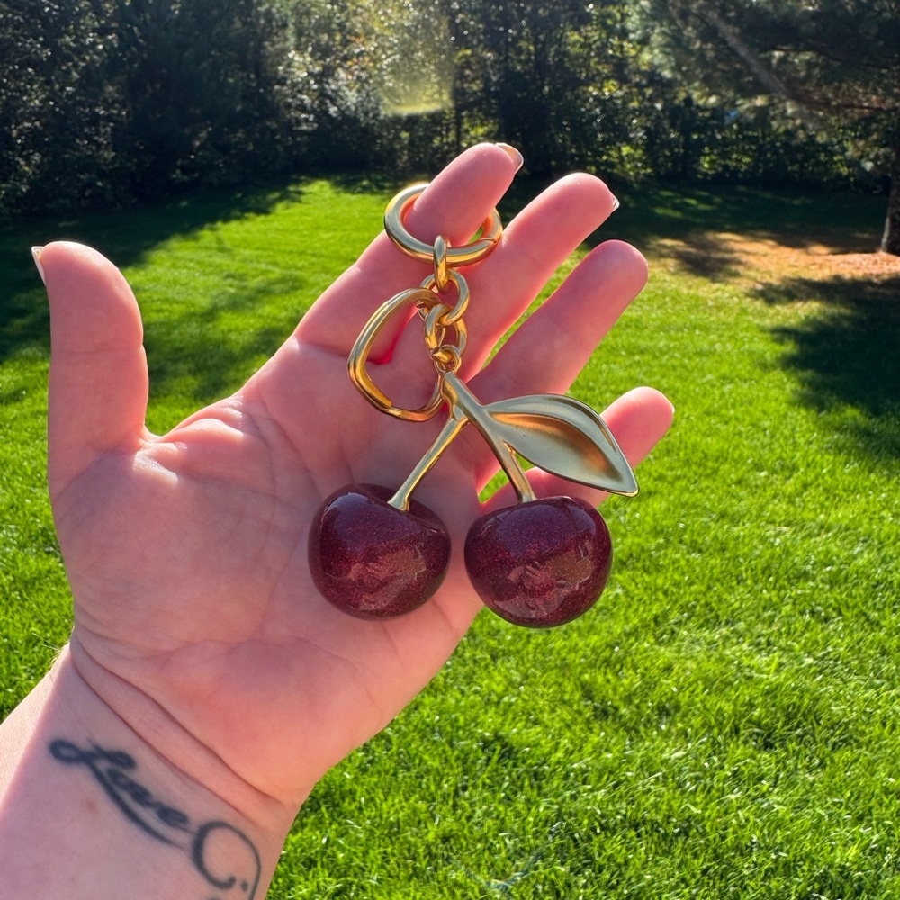 Elegant Gold and Red Cherry Keychain